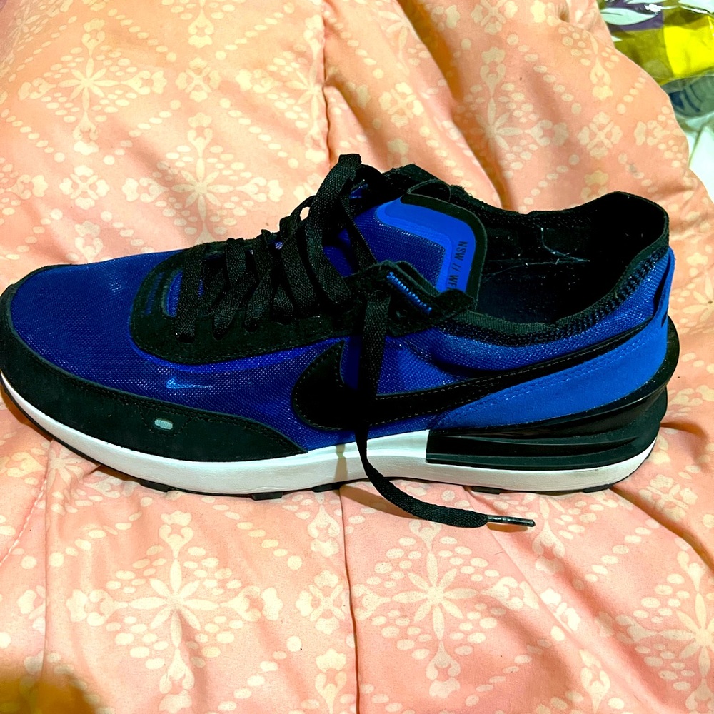 I have a pair of 2022 Nike Waffers Royal Blue, Black, White and Red.  Size 12.